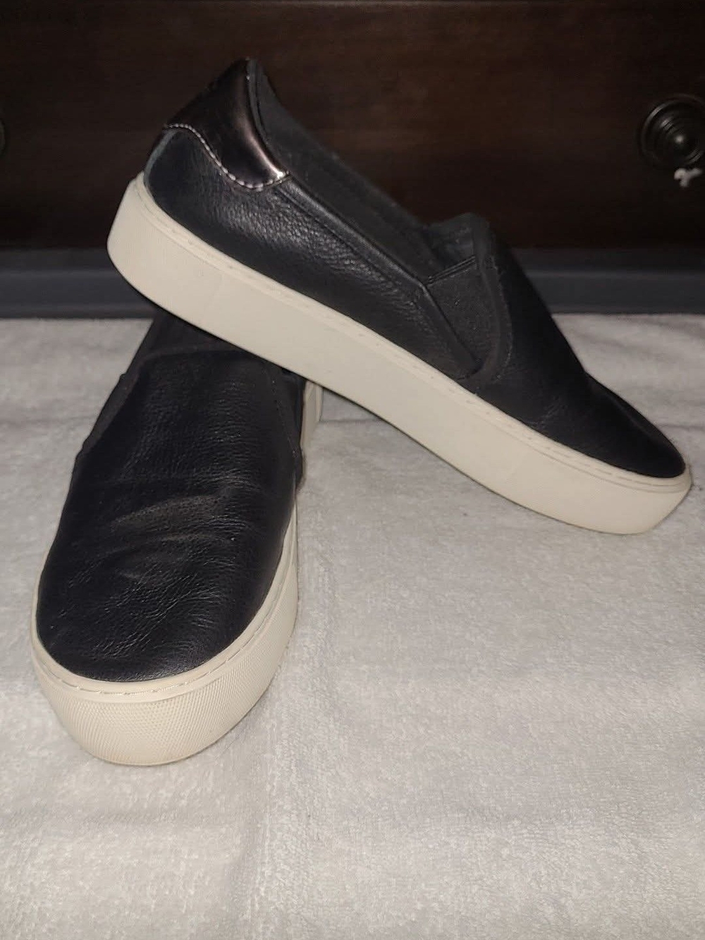 UGG Black Slip-On Leather Sneakers with White Platform Sole